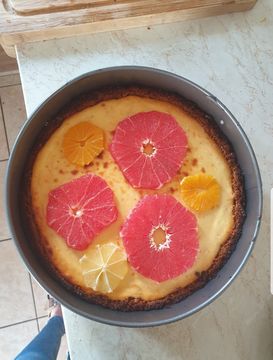 A Cypriot cheesecake with oranges and grapefruits.