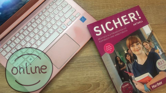A laptop and a magazine to learn German.