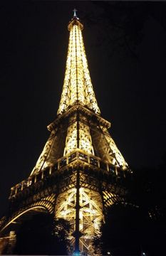 The Eiffel Tower at night, illuminated