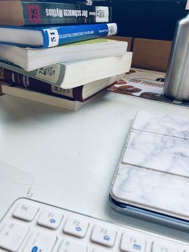 Books, a keyboard and other study materials
