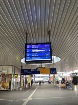 A departures board at a German train station.