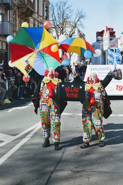 Two clowns cheering at the Rose Monday parade in Mainz