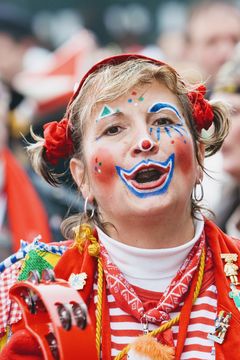 Costumed woman celebrating carnival