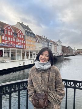 Jinmeng in Copenhagen: The Chinese student poses in front of a typically Danish row of houses in Copenhagen.