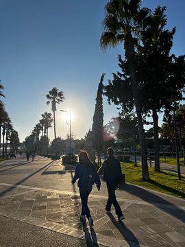 Two girls walking in Limassol.