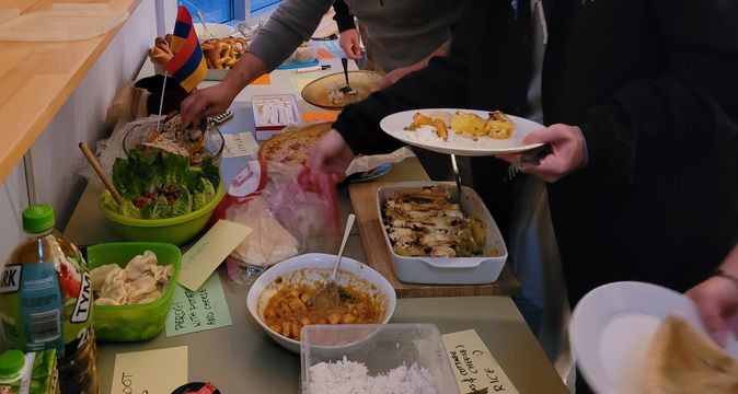 Food on a table: All participants brought something to eat and set it up as a buffet.
