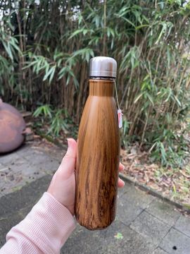 Hot tea on a thermal bottle