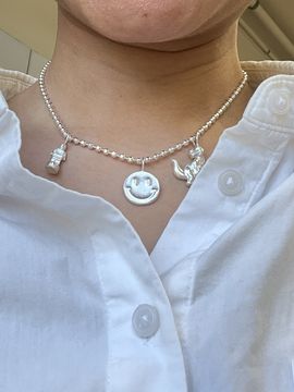 Silver necklace with three pendants