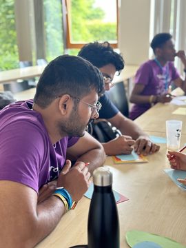 Participants taking notes during Group Work